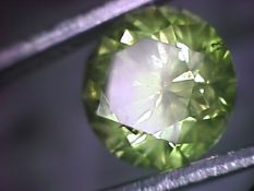 A 1.54 carat round single yellow diamond, as seen through a 30x scope