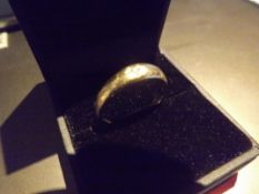 A gentlemans single stone ring, a brilliant cut diamond set in 9 carat gold 2gms