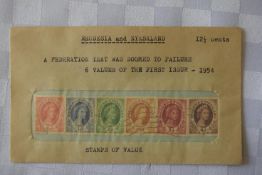 A collection of 6 Rhodesian & Nyasland stamps in a sealed envelope.