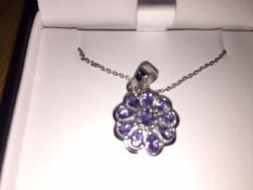 Beautiful Tanzanite Pendant. Stunning 1.73 carat mixed cut Tanzanite gemstones.