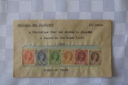 A collection of 6 Rhodesian & Nyasland stamps (the envelope has been opened).