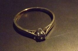 A single stone ring, A brilliant cut diamond of aound 0.2 carat, set in 9 carat yellow gold