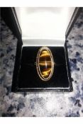 Very large 9 ct gold ring (tiger eye)