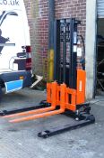2014 Record manual straddle stacker with power lift, Works as new