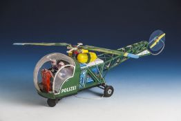 Blechhubschrauber, Herst. unbek., Batterieantrieb, Polizei (Kanzel defekt). L. ca. 41 cm.
