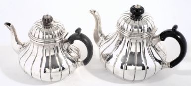 A Victorian silver teapot, maker Robert Garrard II, London, 1838: crested, of squat globular form,