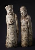 A pair of 17th century (or later) Chinese ivory figures of Guanyin: together with another immortal