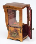 A gilt painted table top display cabinet: in the form of a miniature sedan chair,