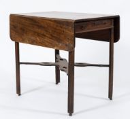 A George III mahogany Pembroke table:, the hinged top with rounded corners,