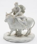 A Continental white biscuit porcelain group of Europa and the Bull: in the Sèvres manner,