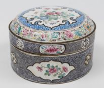 A 19th century Canton enamel box and cover: of circular form with shallow domed hinged lid with