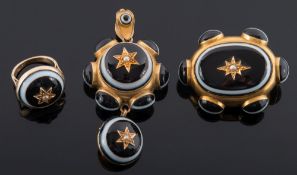 A 19th century gold and banded agate oval brooch: the reverse with hair compartment,