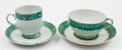 A Bow coffee cup and saucer and a similar teacup and saucer: with pinecone moulded and green enamel