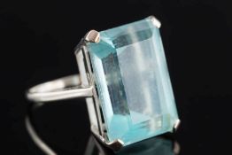 An 18ct white gold and aquamarine single-stone ring: the step-cut aquamarine approximately 20.