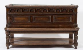 A late Victorian walnut rectangular jardiniere on a stand:, having a metal liner,