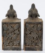 A pair of late 18th century carved oak corbels: the rectangular corbels with grape and vine leaf