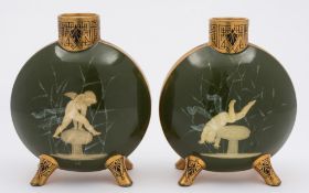 A pair of Moore Brothers pate sur pate moon flasks: each of flattened circular form with short