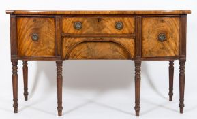 An early 19th Century mahogany bow-fronted sideboard:,