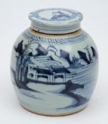 A provincial Chinese porcelain jar and a cover: of oviform the body painted in blue with an