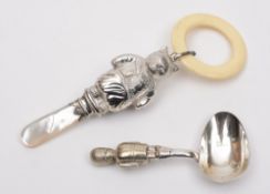 An Elizabeth II  silver baby's rattle, maker WHC, Chester,