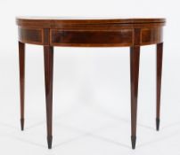 An early 19th Century mahogany, kingwood crossbanded and inlaid half round card table:,