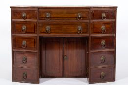 A Regency mahogany and inlaid bow-fronted enclosed kneehole washstand:, bordered with ebony lines,