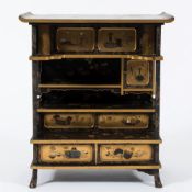 A Japanese black and gilt lacquer table cabinet:,