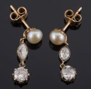 A pair of pearl and diamond drop earrings: each with a single pearl suspending a marquise shaped