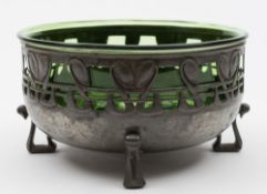Archibald Knox design for Liberty & Co, a Tudric pewter and green glass bowl: model No 0924,