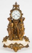 A French Victorian gilt metal and marble mantel clock: the eight-day duration movement striking the