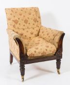 A Regency carved rosewood armchair:, with upholstered stuff over back,