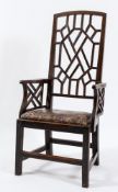 An 18th Century mahogany elbow chair:,