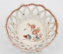 A Bow 'Kakiemon' basket: of small size, the sides pierced with interlocking circles,