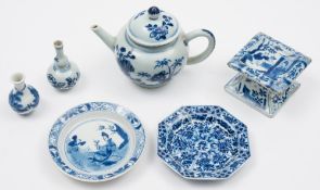 A Chinese blue and white trencher salt and five similar small items of Chinese porcelain: the salt