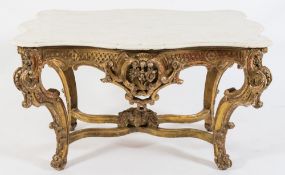 A 19th Century French carved giltwood centre table of serpentine outline in the Louis XV taste:,