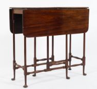 A 19th Century mahogany spider leg occasional table:, the hinged top with rounded corners,