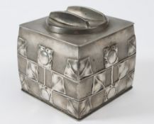 A Tudric pewter biscuit box, to a design by Archibald Knox:, of square outline with lift-off lid,