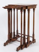 A nest of three early 19th Century mahogany rectangular occasional tables:,