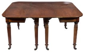 A Regency mahogany and inlaid dining table:, in two parts,