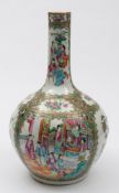 A Canton porcelain bottle vase: enamelled front and verso in the typical palette with panels