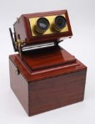 A mahogany and lacquered brass achromatic stereoscope by R and J Beck Cornhill London: with rack