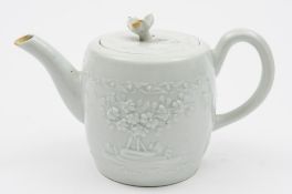 A Worcester barrel shaped teapot and cover: in the white,