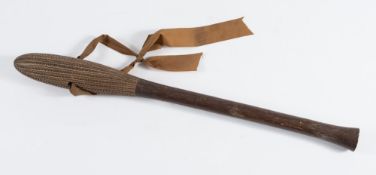 A Tongan war club: the ovoid-shaped  head with incised geometric pattern decoration,