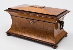 A 19th century satinwood tea caddy : of sarcophagus outline,