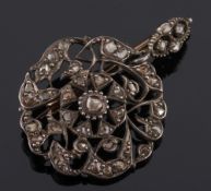 A rose diamond mounted circular pendant brooch:, 6gms gross weight.