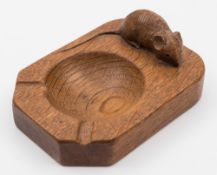 A Mouseman light oak ashtray, by Robert Thompson of Kilburn: 10.5cm.