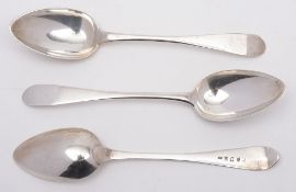 A set of three George III silver serving spoons, maker William Auld, Edinburgh, 1794:,