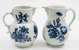 A Worcester blue and white cabbage leaf jug and a similar plain baluster jug: the first with