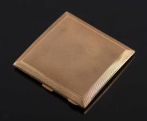 A 9ct gold square cigarette case: with engine turned decoration, Birmingham 1949,