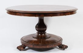 A Victorian rosewood circular breakfast table:,